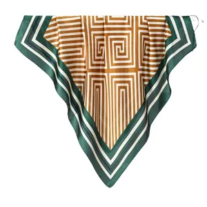 Green and gold silk scarf with geometric retro patterns and classic border design