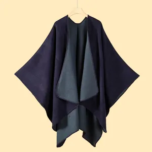 Detail of double-sided knit shawl with ginkgo leaf pattern and stitched edge finish