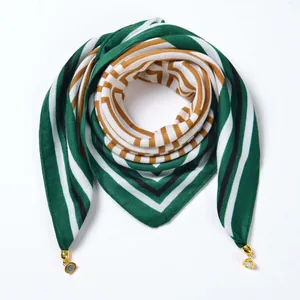 Multicolor geometric striped square scarf with golden metal pendants on white background