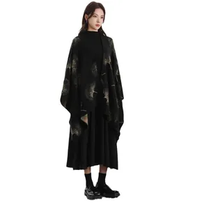 Women's black knit poncho cloak with gold ginkgo leaf pattern for autumn and winter