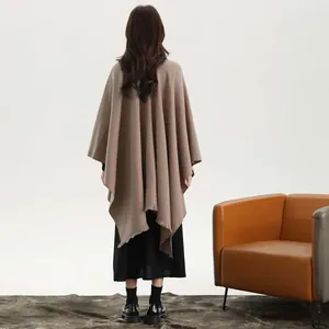 Back view of thick solid color shawl wrap with side ties and soft wool-like texture