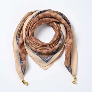 Brown magnetic velvet scarf with geometric patterns and golden metal buckles