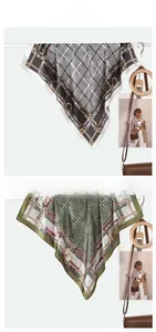 Detail shot of two elegant 70cm silk-feel square scarves with chain and plaid patterns