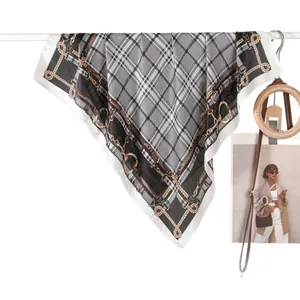 Retro houndstooth and golden chain silk scarf with satin finish on white background