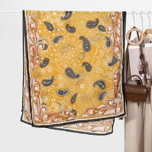 Yellow paisley linen scarf with bohemian mandala pattern and black trim border