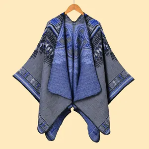 Women's thick knit shawl with abstract ethnic patterns and a split-front poncho style