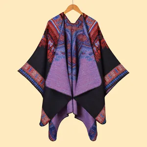 Ethnic knit shawl with abstract geometric patterns and a relaxed split drape design