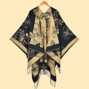 Women's warm shawl poncho with elegant floral jacquard pattern and long tassel hem