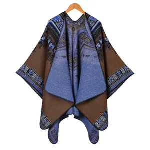 Women's vintage geometric knit shawl poncho with ethnic patterns and tassels for winter