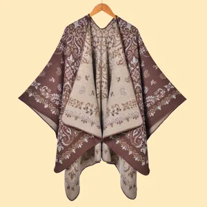 Close-up of vintage leopard paisley jacquard knit shawl with detailed texture