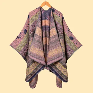 Women's bohemian knit shawl with vintage floral patterns and fringe details