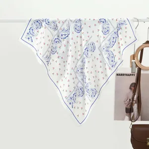Elegant white square neck scarf with classic blue paisley pattern and red floral print