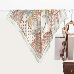 Silk scarf with leopard and tropical palm print in mint green and ivory white