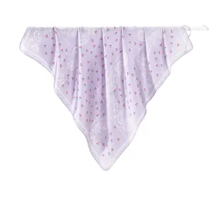 Elegant lavender silk scarf with cherry and paisley patterns hanging on white metal rings