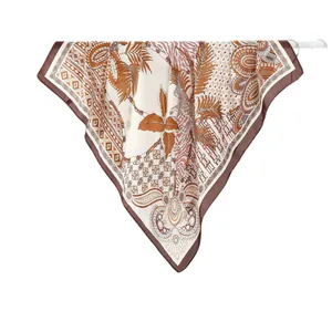 Elegant bohemian silk scarf with leopard and palm leaf print for summer sun protection