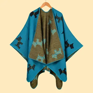 Detail of knitted shawl showing dual-color design and Scottish Terrier pattern