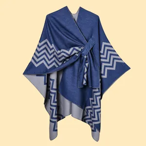Detailed knit texture of wave pattern shawl with modern blue and grey split design