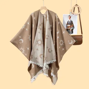 Women's celestial knit shawl with sun moon patterns and fringed hem in brown and beige
