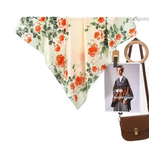 Elegant floral silk scarf for women featuring realistic orange rose print on green fabric