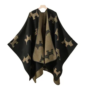 Women's thick knit poncho cape with cartoon Scottie Dog pattern in black and khaki