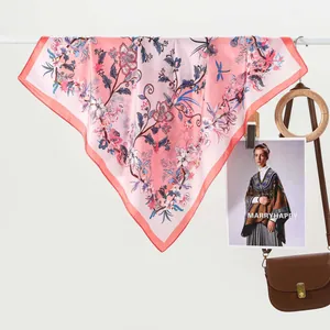 Floral print silk scarf in pastel pink with elegant dragonfly and flower patterns