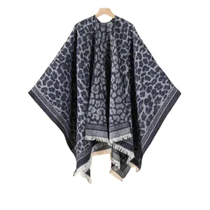 Classic leopard print shawl for women featuring soft knit fabric and tassel hem details