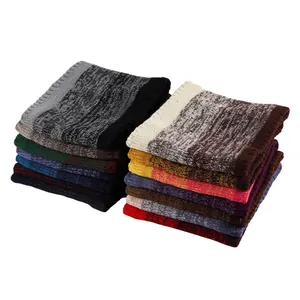 Detailed pile of thick knit neck warmers showing various vibrant gradient color options