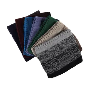Close-up of stacked winter knit neck warmers showing various colors and ribbed texture