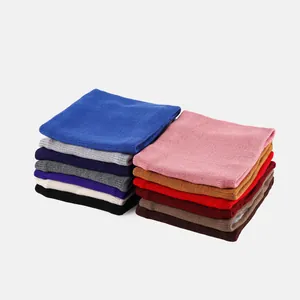 Detail view of winter knitted neck gaiter featuring soft fleece lining and thick wool texture