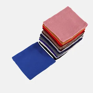 Close-up of colorful ribbed knit neck warmers showing various textures and vibrant colors