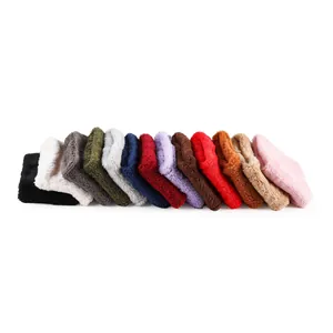 Close-up of double-layer plush neck warmers in various colors for winter protection