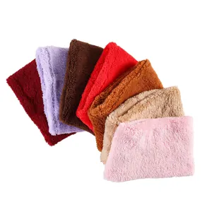 Detail showing various colors of thick faux fur winter neck warmers in a fan layout