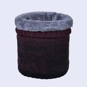Detailed view of the thick fleece lining and two-tone knit texture of this winter neck warmer