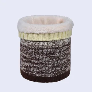 Detail view of winter neck warmer showing brown knit texture and thick white fleece lining