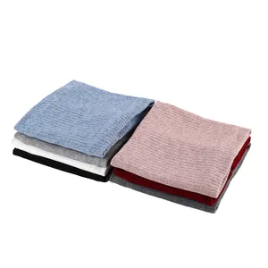 Close-up of colorful ribbed knit snood scarves showing high elastic texture and soft fabric