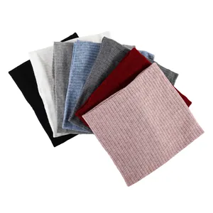 Detailed view of ribbed knit neck warmer stack in seven colors like black and grey