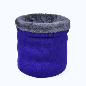 Winter thermal knit neck warmer with royal blue outer layer and gray faux fur lining