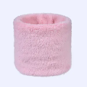 Detailed view of soft pink plush neck warmer showing thick double-layer thermal texture