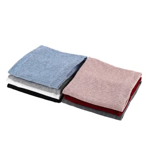 Detail of ribbed knit neck warmer showing thick texture and various color options