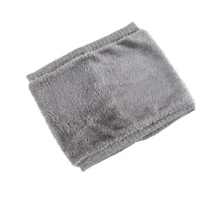 Detailed close-up of the grey plush lining and knitted ribbed edges on this winter neck warmer