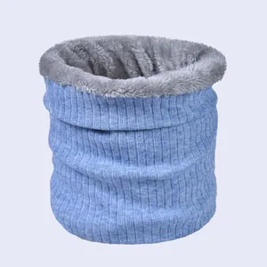 Thick knit neck warmer in light blue with soft grey faux fur lining for winter warmth
