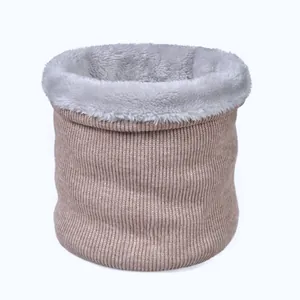 Detail of the camel knit exterior and grey fleece lining on the thermal winter neck warmer