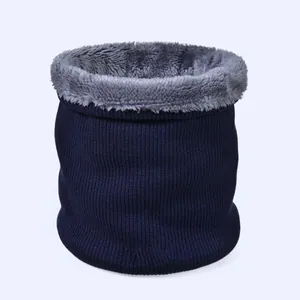 Close-up of winter knit neck warmer with thick fleece lining in navy blue and grey
