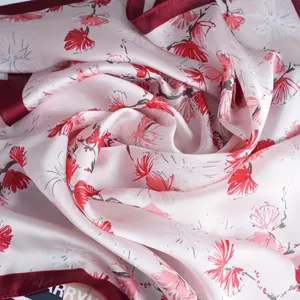 Pink daisy print silk neck scarf with floral pattern and dark red satin border edges