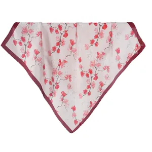 Floral daisy print silk scarf in light pink and brown for sun protection and styling