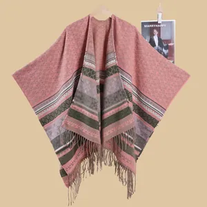 Ethnic knit poncho shawl with geometric diamond patterns and fringe trim for women