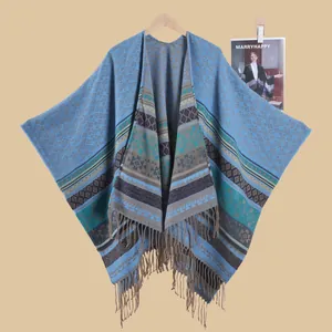 Bohemian geometric knit shawl with tassels in blue and brown for women's travel