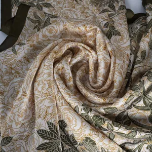 Elegant floral print satin neck scarf in cream and green, luxurious silk-like finish for women