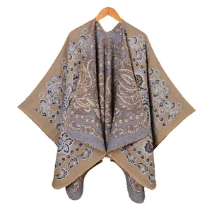 Ethnic paisley pattern thick knit shawl cape with khaki and blue jacquard floral design