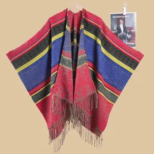Bohemian style colorful knit shawl with ethnic patterns and long fringes for travel